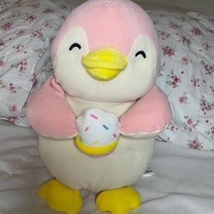 Miniso Penguin Holding a Cupcake Plushie